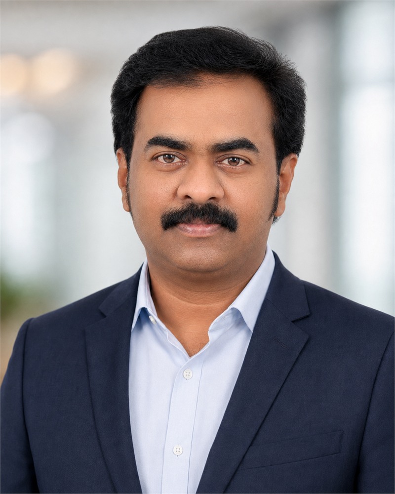 Neppali Sreenivasa Rao in a navy business suit